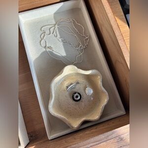 Mother of pearl and sterling silver fish pendant